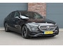 Mercedes-Benz E-klasse 400 e 4MATIC AMG Line | Luchtvering | Achterasbesturing | Hyperscreen | Distronic+ | Trekhaak | Digital Light | HUD | Burmester | Achterbank Verwarmd |3D-Display |