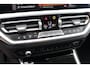 BMW 3-Serie Touring 320i High Executive Edition | Adap. Cruise | Stoelverwarming | Halfleder | Navigatie | Carplay