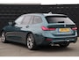 BMW 3-Serie Touring 320i High Executive Edition | Adap. Cruise | Stoelverwarming | Halfleder | Navigatie | Carplay