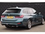 BMW 3-Serie Touring 320i High Executive Edition | Adap. Cruise | Stoelverwarming | Halfleder | Navigatie | Carplay