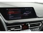 BMW 1-Serie 118i 136pk Business Edition Plus Trekhaak Camera Leder Navigatie Stoelverwarming