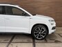 Skoda Karoq 1.5 TSI DSG 4x4 Sportline Business | 1800KG Trekgewicht | Carplay | Sportstoelen | Camera