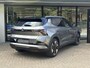 Mitsubishi Eclipse Cross Intense 87 kWh NIEUW UIT VOORRAAD LEVERBAAR | Warmtepomp | Apple CarPlay & Android Auto | Adaptieve Cruise Control | Verwarmbare voorstoelen | Elektrisch bedienbare achterklep | Navigatiesysteem | 8 jaar fabrieksgarantie