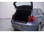 BMW 1-Serie 116i Introduction airco sportstoelen mistlampen-voor stuurbediening cruise-controle 16"-lmv