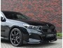 BMW 5-Serie Touring 550e xDrive | M Performance - Pano - B&W