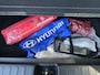 Hyundai Ioniq 5 Connect 77.4 kWh / Dealer onderhouden / Accu SoH 97% / Fabrieksgarantie tot 04-2028 / Afn. Trekhaak 1.600 kg / Navi / Apple Carplay Android / Elektrische stoelen / Stuur-, stoel- & achterbankverwarming / 19" LM wielen & All Season banden /