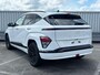Hyundai Kona Electric Pure Edition 64.8 kWh / €1500,- Voordeel / Uit Voorraad Leverbaar / Stoel- & Stuurverwarming / Achteruitrijcamera / Parkeersensoren Voor + Achter / Dynamische Navigatie / Climate Control / Adaptive Cruise Control /