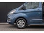 Ford Transit Custom 300 2.0 TDCI L2H1 Limited DC | Achteruitrijcamera | Airco | Lichtmetalen velgen 16" | Dubbele schuifdeur | 100% Dealer O.h. | Trekhaak | MARGE | Leder