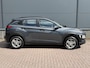 Hyundai Kona 1.0T Essence / Dealer Onderhouden / Trekhaak / 1200KG Trekgewicht / Navigatie / Achteruitrijcamera / Krell Audio / Parkeersensoren Achter / All-Season Banden /
