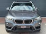 BMW X1 SDrive20i Corporate Lease High Executive M Pakket | Carplay | Leder | Dealer OH | Trekhaak