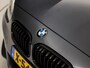 BMW 1-Serie M140i M Sport High Executive 340Pk Automaat (6 CILINDER, M PAKKET, HARMAN/KARDON, ALCANTARA, CAMERA, SPORTSTOELEN, M SPORTREMMEN, NAVIGATIE, STOELVERWARMING, GETINT GLAS, NIEUWSTAAT)