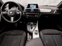 BMW 1-Serie M140i M Sport High Executive 340Pk Automaat (6 CILINDER, M PAKKET, HARMAN/KARDON, ALCANTARA, CAMERA, SPORTSTOELEN, M SPORTREMMEN, NAVIGATIE, STOELVERWARMING, GETINT GLAS, NIEUWSTAAT)