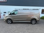 Ford Transit Custom GB 2.0 TDCi 170PK 320 L2H1 Limited/ 18 Inch/ RVS Imperiaal/ Sidebars/ Vloer + wand platen/ Stoelverwarming/ Trekhaak/ Apple Carplay/ Zeer nette bus