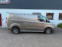 Ford Transit Custom GB 2.0 TDCi 170PK 320 L2H1 Limited/ 18 Inch/ RVS Imperiaal/ Sidebars/ Vloer + wand platen/ Stoelverwarming/ Trekhaak/ Apple Carplay/ Zeer nette bus