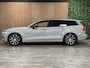 Volvo V60 T6 AWD Recharge Ultra Dark | Trekhaak | Schuifdak | Head-Up Display | Harman Kardon | Adaptieve Cruise Control | Stoelverwarming voor+achter | Stuurwielverwarming | Full LED Meesturende koplampen | Parkeercamera | Pilot Assist | BLIS Dode Hoek Detectie | Elektrische voorstoelen geheugen | Lederen bekleding | Zitting verlenging voorstoelen | Lederen dashboard | Google Infotainment | Keyless Drive | Parkeersensoren voor+achter | Privacy Glass | Elektrisch bedienbare achterklep | DAB Radio | Apple Carplay/Android Auto | Volvo On Call met mobiele App functie | Vapour Grey Metallic |