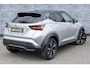 Nissan Juke 1.0 DIG-T 116 Premiere Edition | Two-Tone | Achteruitrijcamera | Parkeersensoren | Stoelverwarming | Verwarmde Voorruit | Keyless Entry | LED Koplampen | Navigatie | Apple Carplay | Android Auto | Lichtmetalen Velgen 19 inch