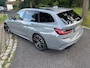 BMW 3-Serie Touring 330e xDrive High Executive M Sport Nardo Grau Individual metallic Panoramadak Trekhaak 19 Inch Adaptive ophanging M-Technic ACC Elek Stoelverstelling Interieurlijsten Carbon