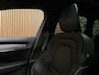 Volvo V90 T8 AWD Plus Dark Long Range | Schuifdak | Harman Kardon | 455pk | Adaptieve Cruise Control | Stoelverwarming voor+achter | Stuurwielverwarming | 19 Inch | Full LED Meesturende koplampen | Pilot Assist | BLIS Dode Hoek Detectie | Elektrische voorstoelen geheugen | R-Design Contourstoelen Nappa Leder met wit stiksel en bies | Zitting verlenging voorstoelen | Lederen Dashboard | Keyless Drive | Parkeersensoren voor+achter | Privacy Glass | Elektrisch bedienbare achterklep | Geïntegreerde zongordijnen achterportieren | Verlichte instaplijsten | DAB Radio | Apple Carplay/Android Auto | Volvo On Call met mobiele App functie | Denim Blue Black Metallic |