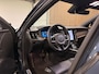 Volvo V90 T8 AWD Plus Dark Long Range | Schuifdak | Harman Kardon | 455pk | Adaptieve Cruise Control | Stoelverwarming voor+achter | Stuurwielverwarming | 19 Inch | Full LED Meesturende koplampen | Pilot Assist | BLIS Dode Hoek Detectie | Elektrische voorstoelen geheugen | R-Design Contourstoelen Nappa Leder met wit stiksel en bies | Zitting verlenging voorstoelen | Lederen Dashboard | Keyless Drive | Parkeersensoren voor+achter | Privacy Glass | Elektrisch bedienbare achterklep | Geïntegreerde zongordijnen achterportieren | Verlichte instaplijsten | DAB Radio | Apple Carplay/Android Auto | Volvo On Call met mobiele App functie | Denim Blue Black Metallic |