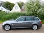 BMW 3-Serie Touring 318i 143pk Clima Cruise Navi Schuifdak Trekhaak 1250kg.