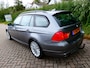 BMW 3-Serie Touring 318i 143pk Clima Cruise Navi Schuifdak Trekhaak 1250kg.