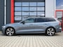 Volvo V60 2.0 T6 AWD Long Range 398PK R Design Thunder Grey | Pano | Trekhaak | Leder | Memory | Matrix Led | Stoel & Stuurwielverwarming | Camera | PDC | Digital Dash | Dodehoek Detectie | Adaptive Cruise | Keyless | Lane Assist | Carplay