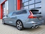 Volvo V60 2.0 T6 AWD Long Range 398PK R Design Thunder Grey | Pano | Trekhaak | Leder | Memory | Matrix Led | Stoel & Stuurwielverwarming | Camera | PDC | Digital Dash | Dodehoek Detectie | Adaptive Cruise | Keyless | Lane Assist | Carplay