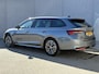 Skoda Octavia Combi 1.5 TSI MHEV Sportline / Fabrieksgarantie t/m 12-2026 / Adaptieve Cruise Control / Navigatie / Apple Carplay/Android Auto / Achteruitrijcamera / Stoelverwarming / Sportstoelen / Elektrische achterklep /