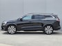 Renault Espace E-Tech full hybrid 200 iconic 7p. / Fabrieksgarantie tot 09-2027 / Panoramadak / Harman Kardon / Pack Advanced Drive / All season banden / Trekgewicht 1500 kg / Elektrische achterklep / Stuur- Stoel & Voorruit verwarming / Rondomzicht camera /