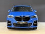 BMW X1 xDrive25e High Executive | M-pakket | Camera | Afn. trekhaak | Leder | Sfeerverlichting | Full LED