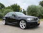 BMW 1-Serie Coupé 135i High Executive | Origineel NL | Handgeschakeld | 18" Velgen | Stoelverwarming | Clima | Navi | PDC | Cruise