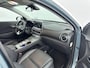 Hyundai Kona Electric EV Premium 64 kWh | Stoelverwarming & verkoeling | Achteruitrij camera | Navigatie | Adaptive cruise | Side skirts | All season banden |