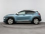 Hyundai Kona Electric EV Premium 64 kWh | Stoelverwarming & verkoeling | Achteruitrij camera | Navigatie | Adaptive cruise | Side skirts | All season banden |