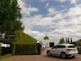 BMW X1 sDrive18i | Handbak | Uniek | PearlWeiss | Leer | Nav | All-black! | Privacy glass