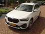 BMW X1 sDrive18i | Handbak | Uniek | PearlWeiss | Leer | Nav | All-black! | Privacy glass
