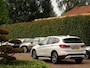 BMW X1 sDrive18i | Handbak | Uniek | PearlWeiss | Leer | Nav | All-black! | Privacy glass