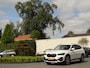BMW X1 sDrive18i | Handbak | Uniek | PearlWeiss | Leer | Nav | All-black! | Privacy glass