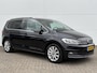 Volkswagen Touran 1.5 TSI Highline 7p / Navigatiesysteem full map / Voorstoelen verwarmd / 7 personen / Cruise control adaptief /