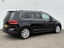 Volkswagen Touran 1.5 TSI Highline 7p / Navigatiesysteem full map / Voorstoelen verwarmd / 7 personen / Cruise control adaptief /