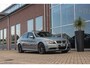 BMW 3-Serie 330i | Stoelverwarming | Schuifdak | PDC | Cruise control | Climate control | Navigatie Professional | Bluetooth | HiFi audio | 18 inch | M-sport bumpers | Spiegelpakket