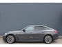 BMW i4 eDrive40 84 kWh M-Sport SOH-100% Dravitgrau Schuif-/kanteldak Leer Harman-Kardon Camera