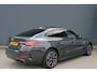 BMW i4 eDrive40 84 kWh M-Sport SOH-100% Dravitgrau Schuif-/kanteldak Leer Harman-Kardon Camera