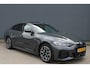 BMW i4 eDrive40 84 kWh M-Sport SOH-100% Dravitgrau Schuif-/kanteldak Leer Harman-Kardon Camera