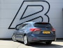 Ford Focus Wagon 1.0 EcoBoost Titanium Business 2e Eigenaar|Pano|Stoel+stuurverw|Adap Cruise|Carplay|HUD|Dealer Onderhouden|Camera|Clima|PDC V+A|Trekhaak|LM velgen|Navi|Elek Ramen|N.A.P.|APK tot 07-2027