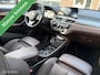 BMW X1 sDrive20i High Executive|Afneembare Trekhaak|HUD|Sportstoelen|Leer|Zwarte Hemel|Sfeerverlichting|Carplay.