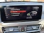 BMW X1 sDrive20i High Executive|Afneembare Trekhaak|HUD|Sportstoelen|Leer|Zwarte Hemel|Sfeerverlichting|Carplay.