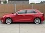 Audi A3 Sportback 30 TFSI Advanced edition Automaat | Stoelverwarming | Parkeersensoren voor en achter | Climate control | Cruise control adaptief | Tangorood Metallic | Achteruitrijcamera