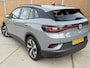 Volkswagen ID.4 Life 77 kWh Warmtepomp | 20 inch velgen | LED verlichting | Navigatiesysteem | Apple CarPlay/Android Auto | Cruise control adaptief | Climate control | Voorstoelen verwarmd | Parkeersensoren voor en achter