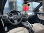 BMW 1-Serie M140i xDrive High Executive LCI 2 | Leder | Keyless Entry | Maxton | Stoelverwarming |
