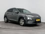Hyundai Kona Electric EV Premium 64 kWh | Camera | SOH 95,2% | Warmtepomp | Navi & Carplay/Android | Clima | Stoelverkoeling & Stoel stuur verwarming |Trekhaak voor fietsendrager